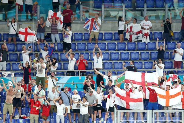 <p>England fans celebrate after the Euro 2020 quarter-final win over Ukraine in Rome</p>