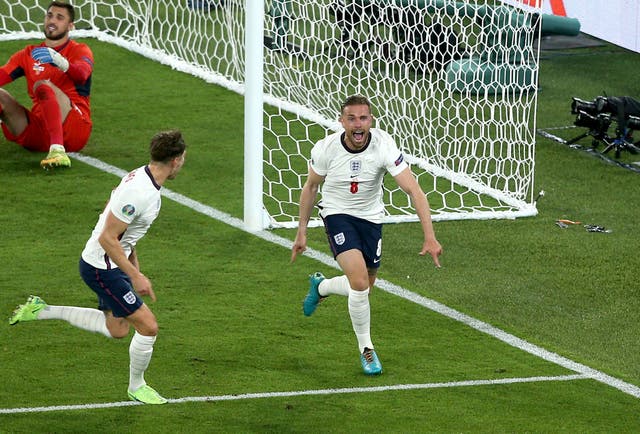 England’s Jordan Henderson celebrates scoring their side’s fourth goal against Ukraine in Rome