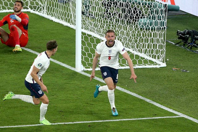 England’s Jordan Henderson celebrates scoring their side’s fourth goal against Ukraine in Rome