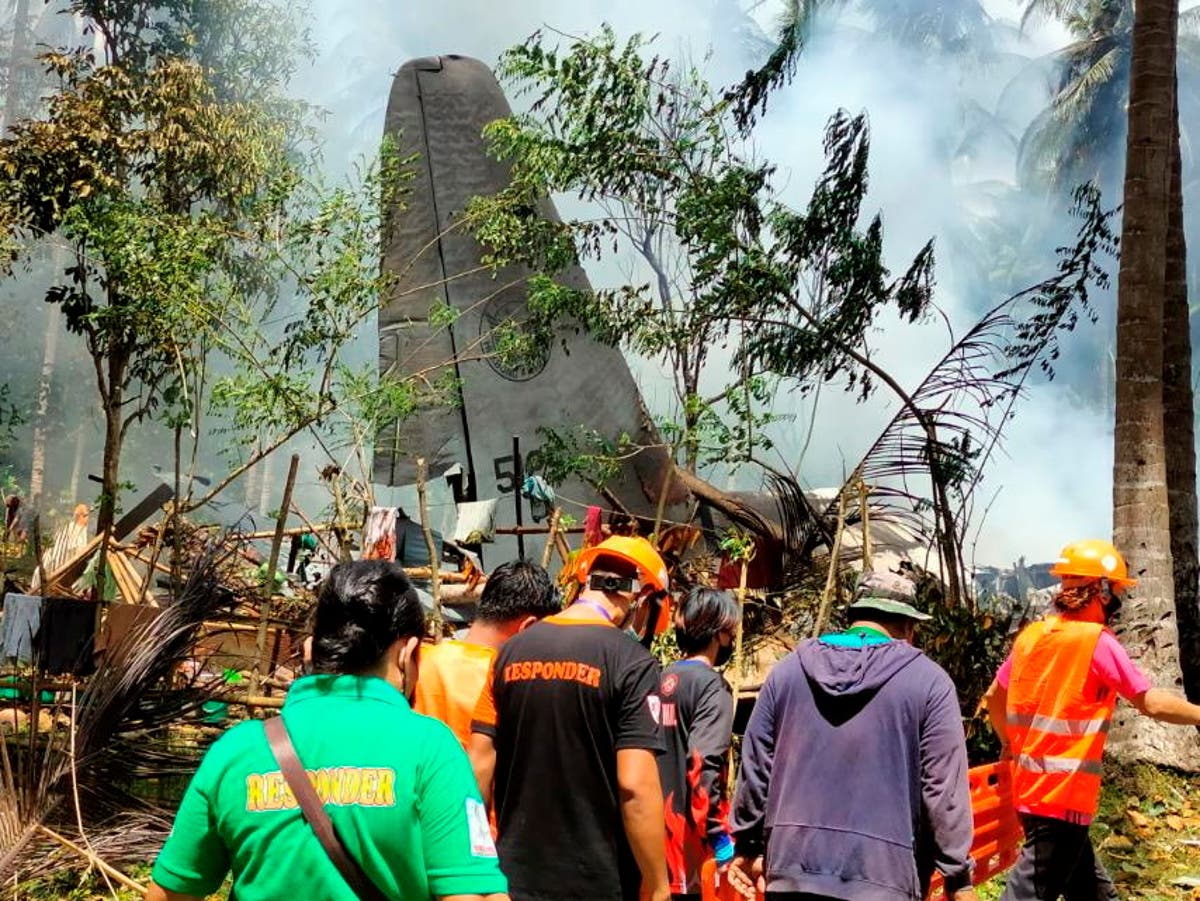 At least 45 dead after Philippines military plane misses runway and