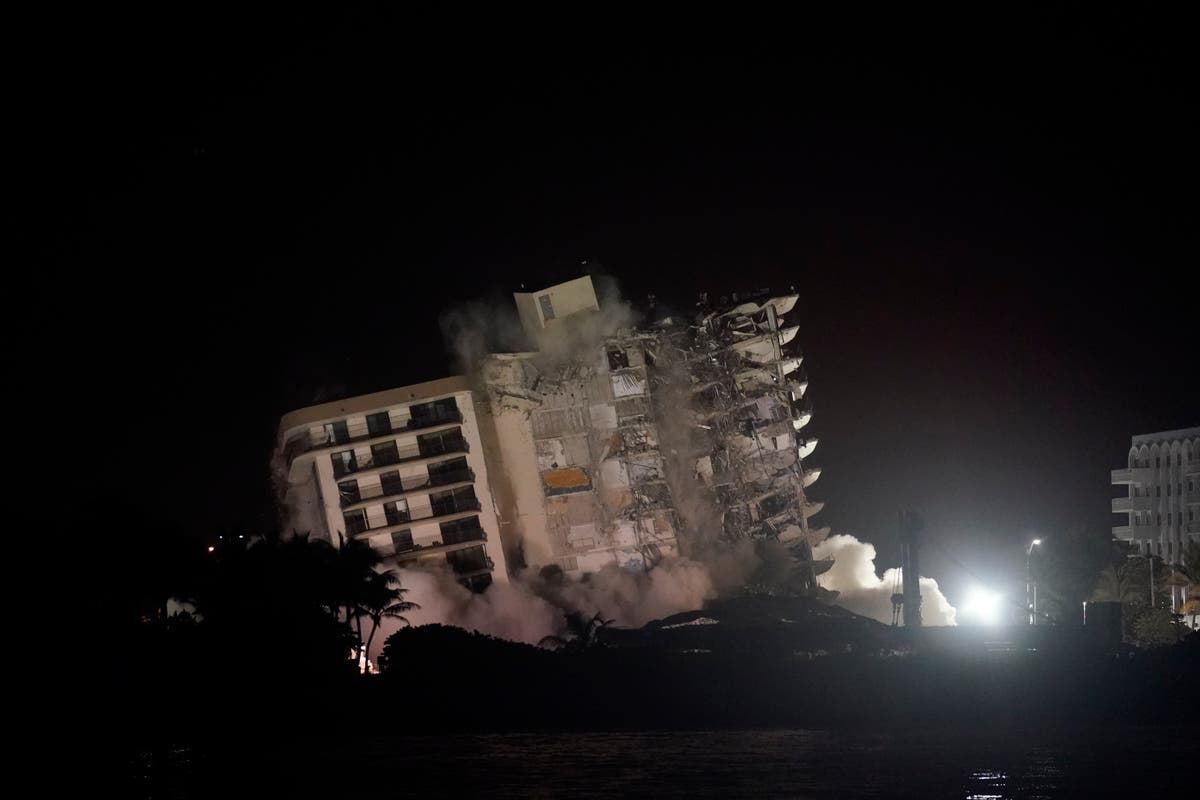Explosives set off to bring down rest of collapsed condo
