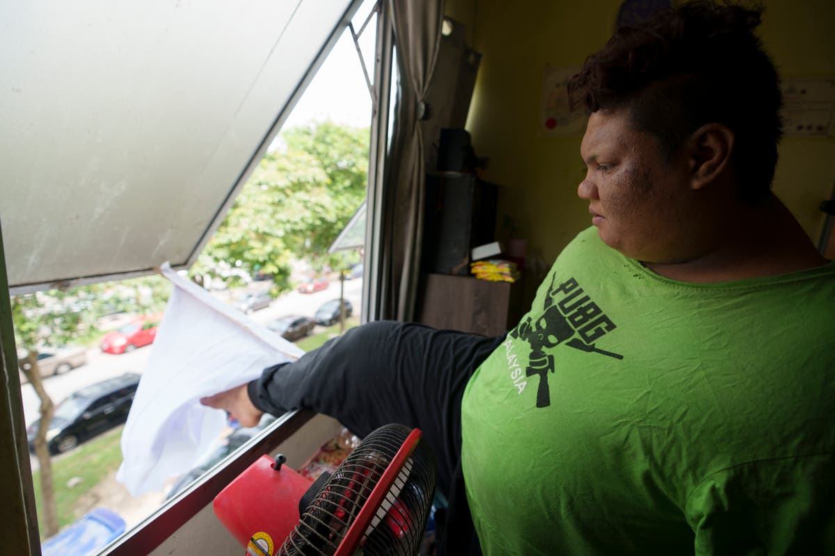 Malaysians suffering amid lockdown fly white flag for help