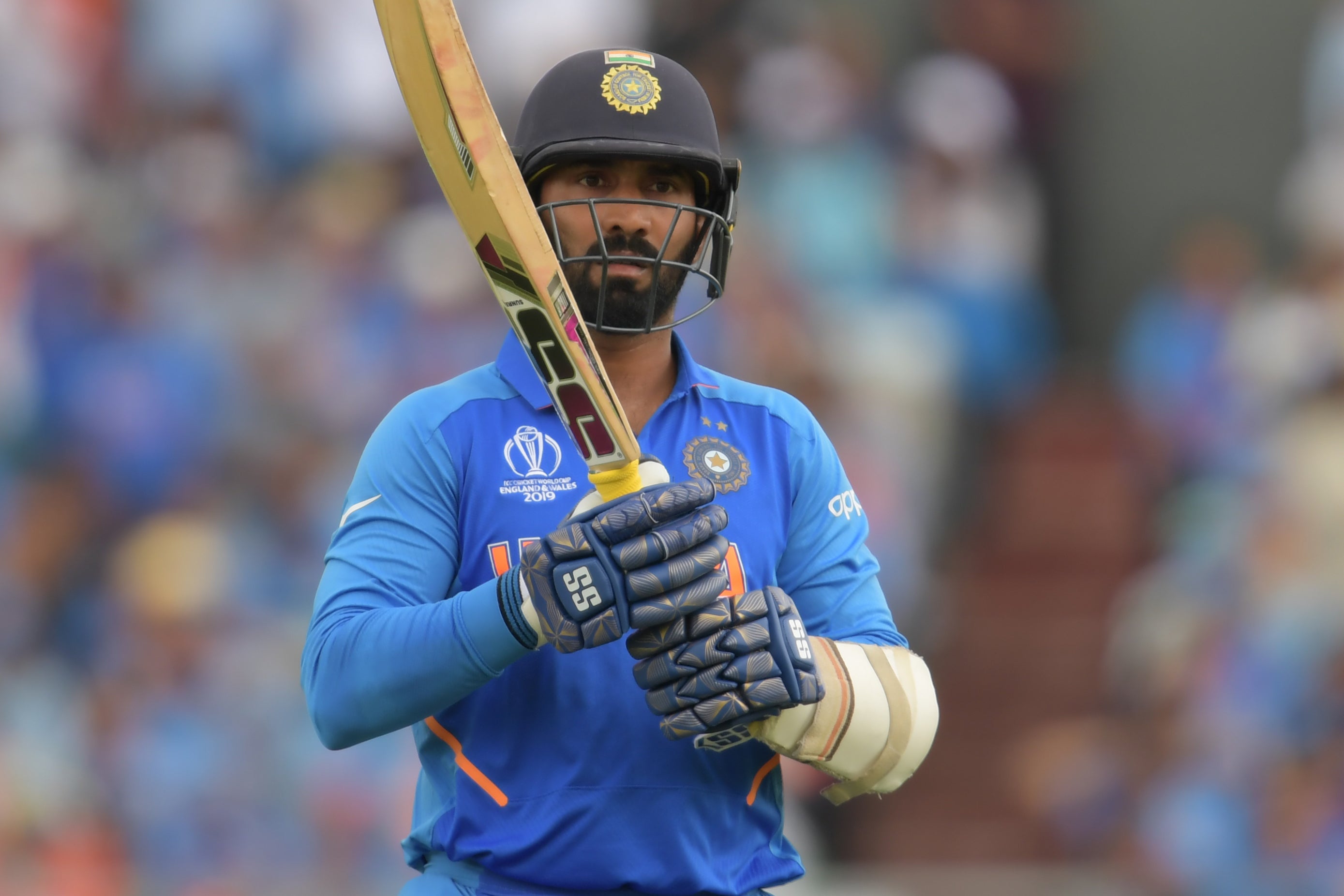 File: India's Dinesh Karthik is seen during the 2019 Cricket World Cup first semi-final between New Zealand and India at Old Trafford in Manchester, on 10 July 10 2019. Karthik was criticised for comments comparing a bat to a neighbour’s wife during the England vs Sri Lanka match