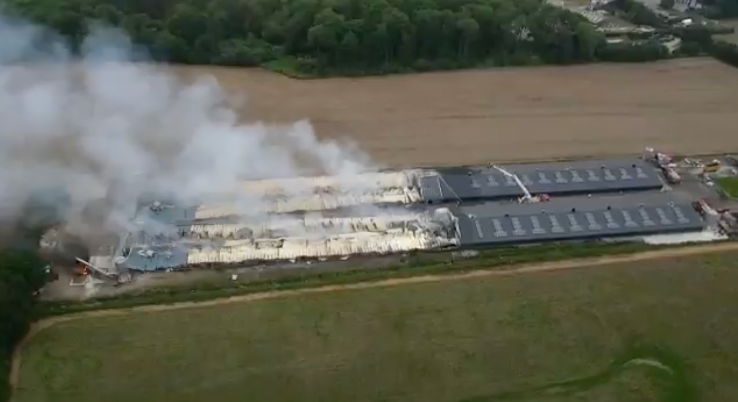 Drone footage showing fire crews controlling the last of the fire