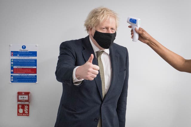 PM Boris Johnson gives a thumbs up