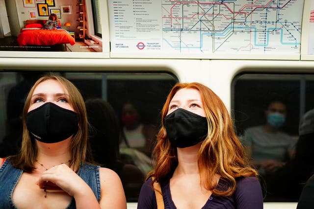 <p>Masks will no longer be compulsory in public places under government plans later this month</p>