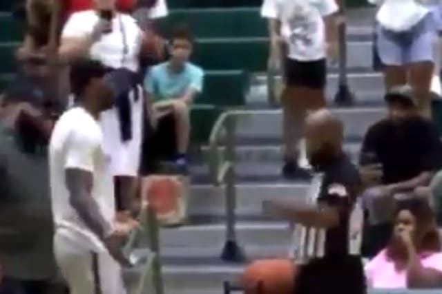 <p>LeBron James confronts a court-side announcer at his son’s basketball game who suggested the boy was given a foul because he was playing in an arena named after his father</p>