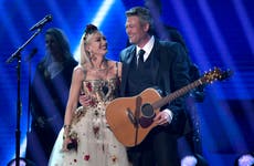 Gwen Stefani and Blake Shelton reveal wedding photos as country star sports jeans at reception