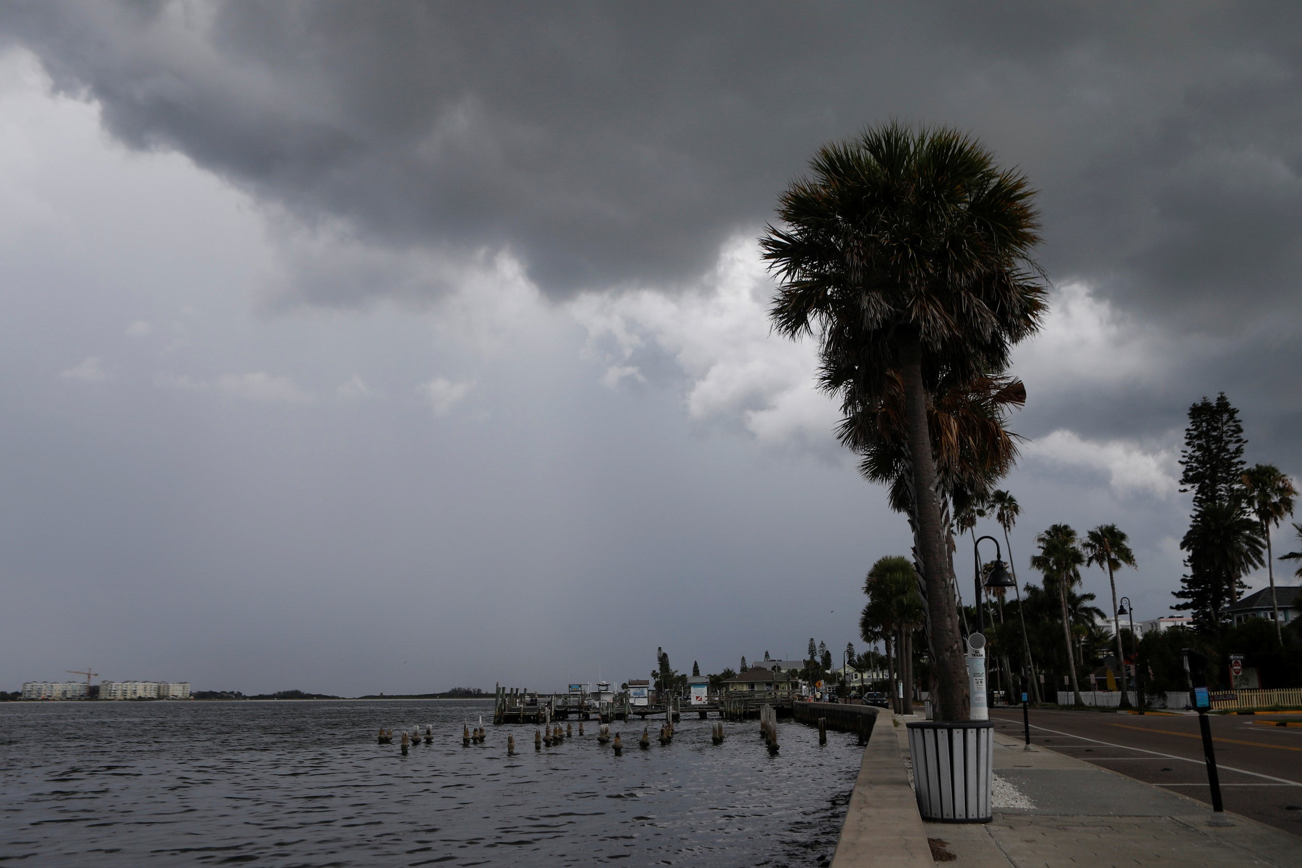 Dark clouds loom over the Pass-A-Grille channel in St. Petersburg, Florida, US