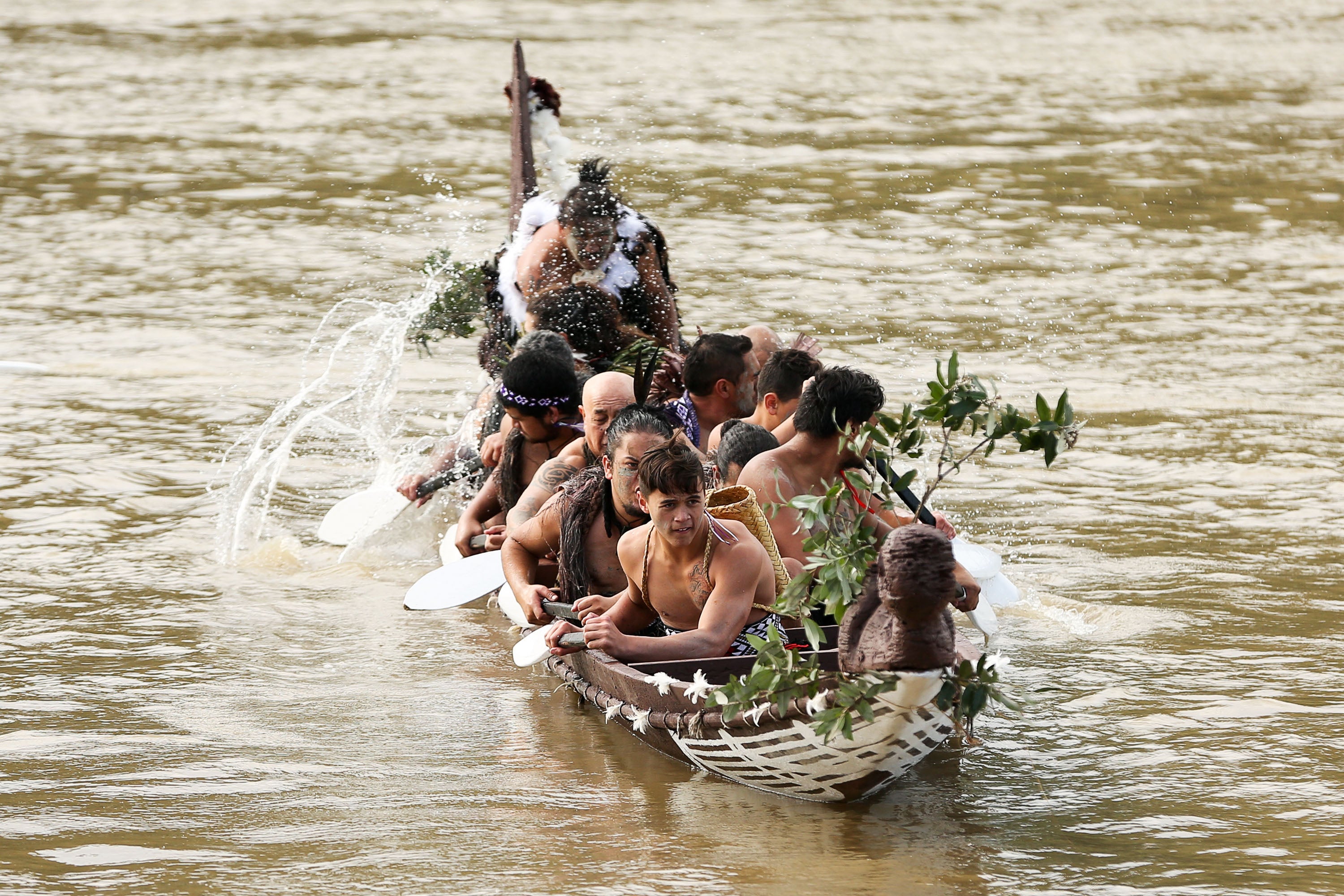 A Maori crew sailing the Whanganui River