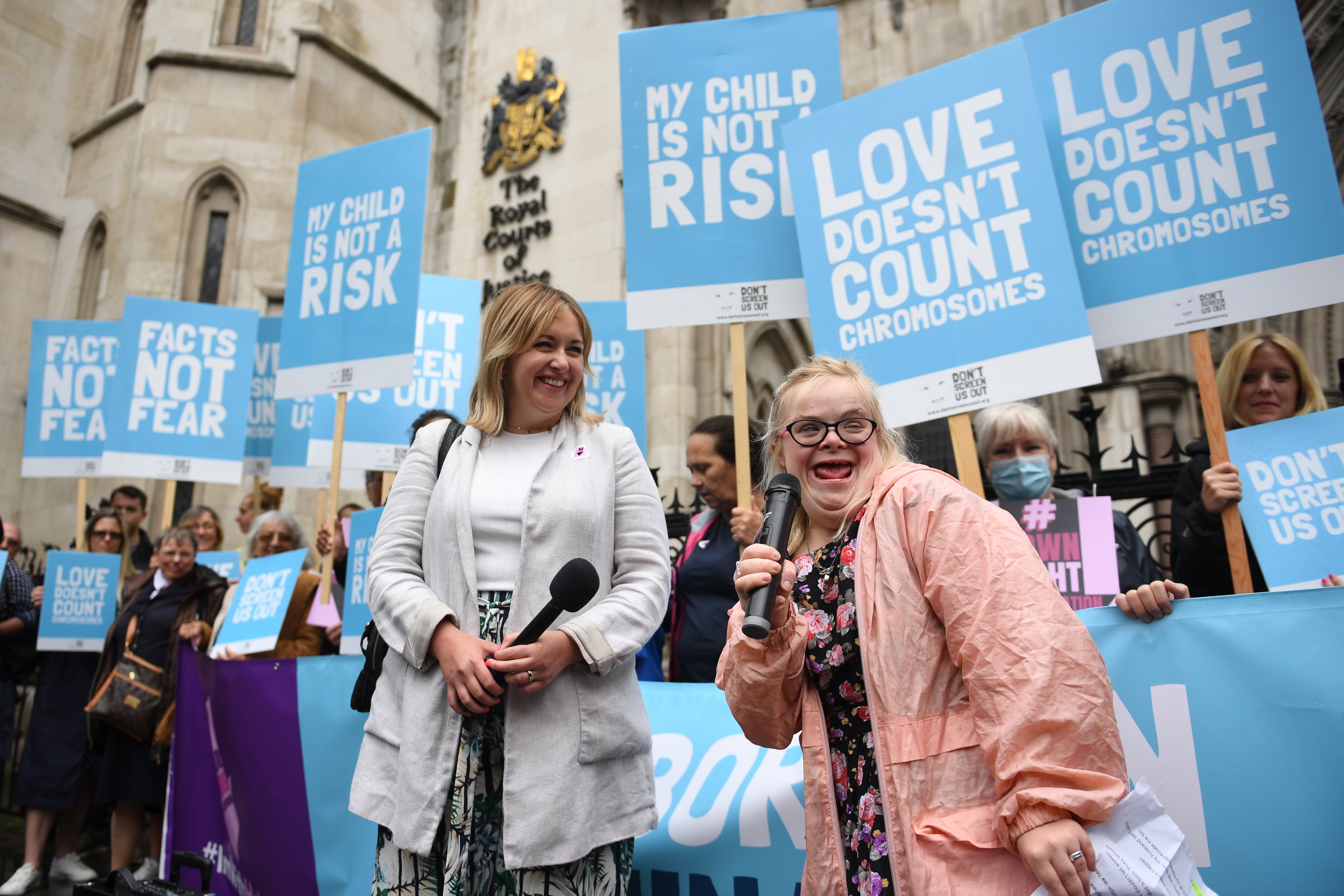 Heidi Crowter (right) and Maire Lea-Wilson are pictured outside the Royal Courts of Justice, London, on 6 July, 2021.