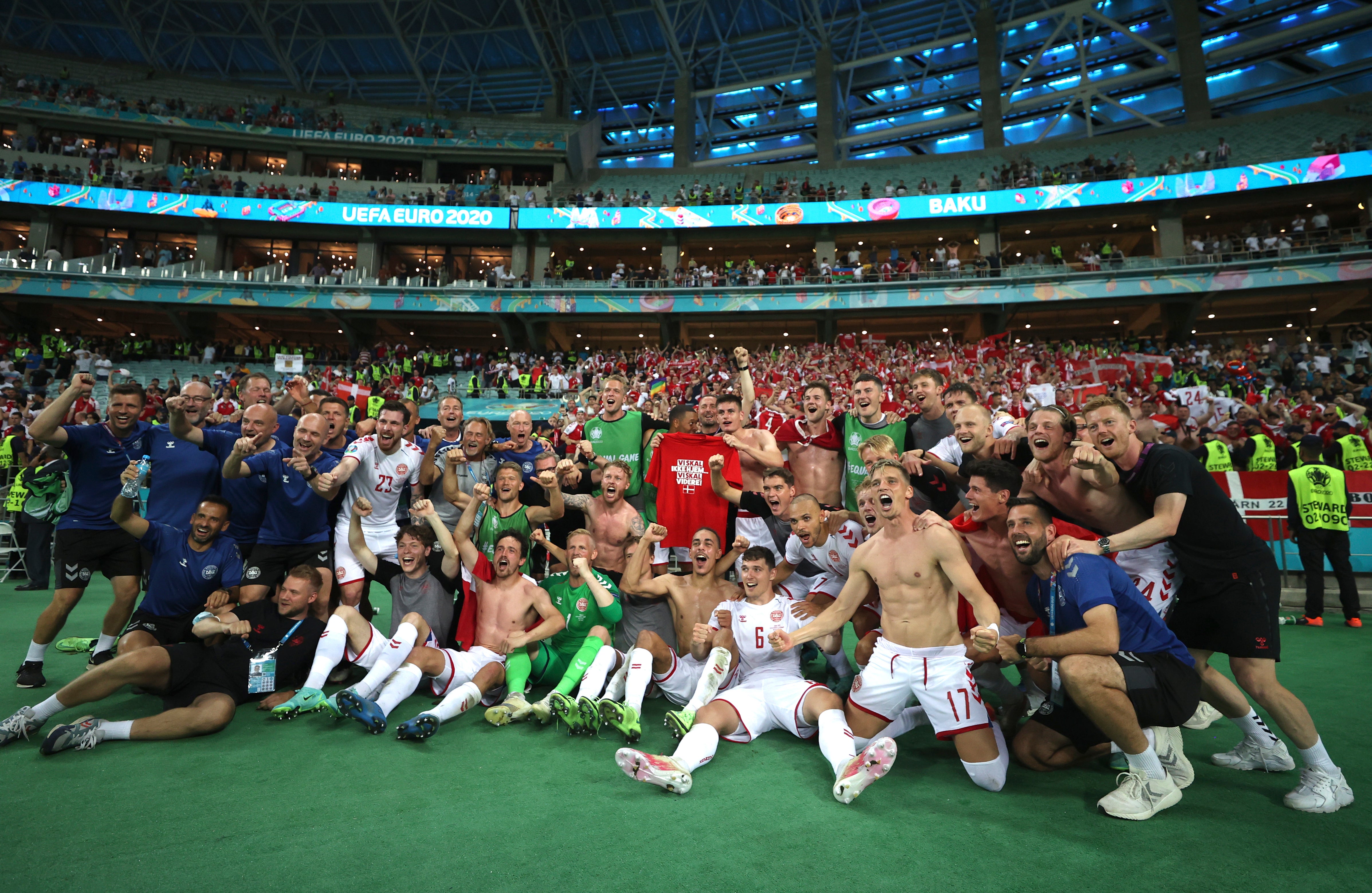 Denmark players celebrate their semi-final victory