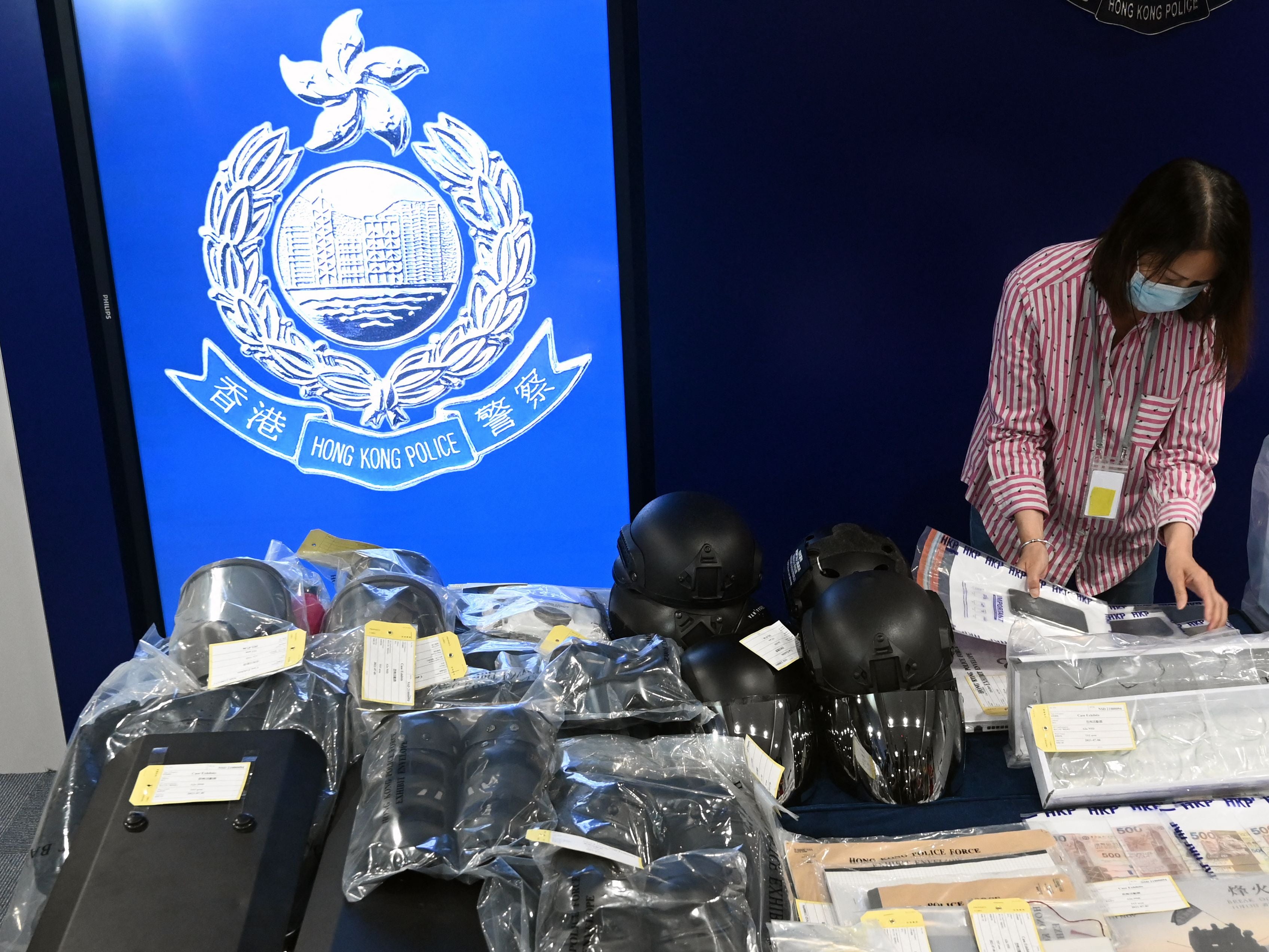 Seized items on display at the Hong Kong police headquarters after nine people were arrested, accused of involvement in a terrorist bombing plot