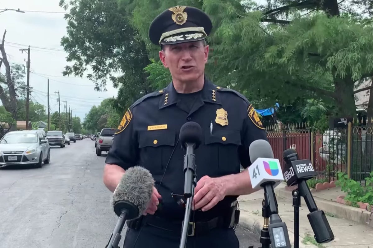 Man shot dead by police after firing on news team covering house fire ...
