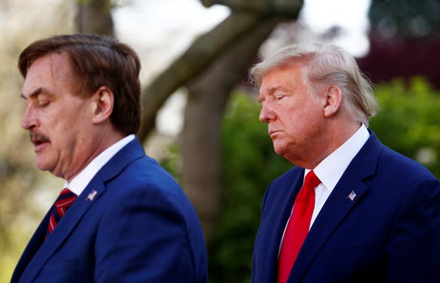 <p>My Pillow CEO Michael Lindell speaks as U.S. President Donald Trump listens during the daily coronavirus response briefing in the Rose Garden at the White House in Washington, U.S., March 30, 2020.</p>