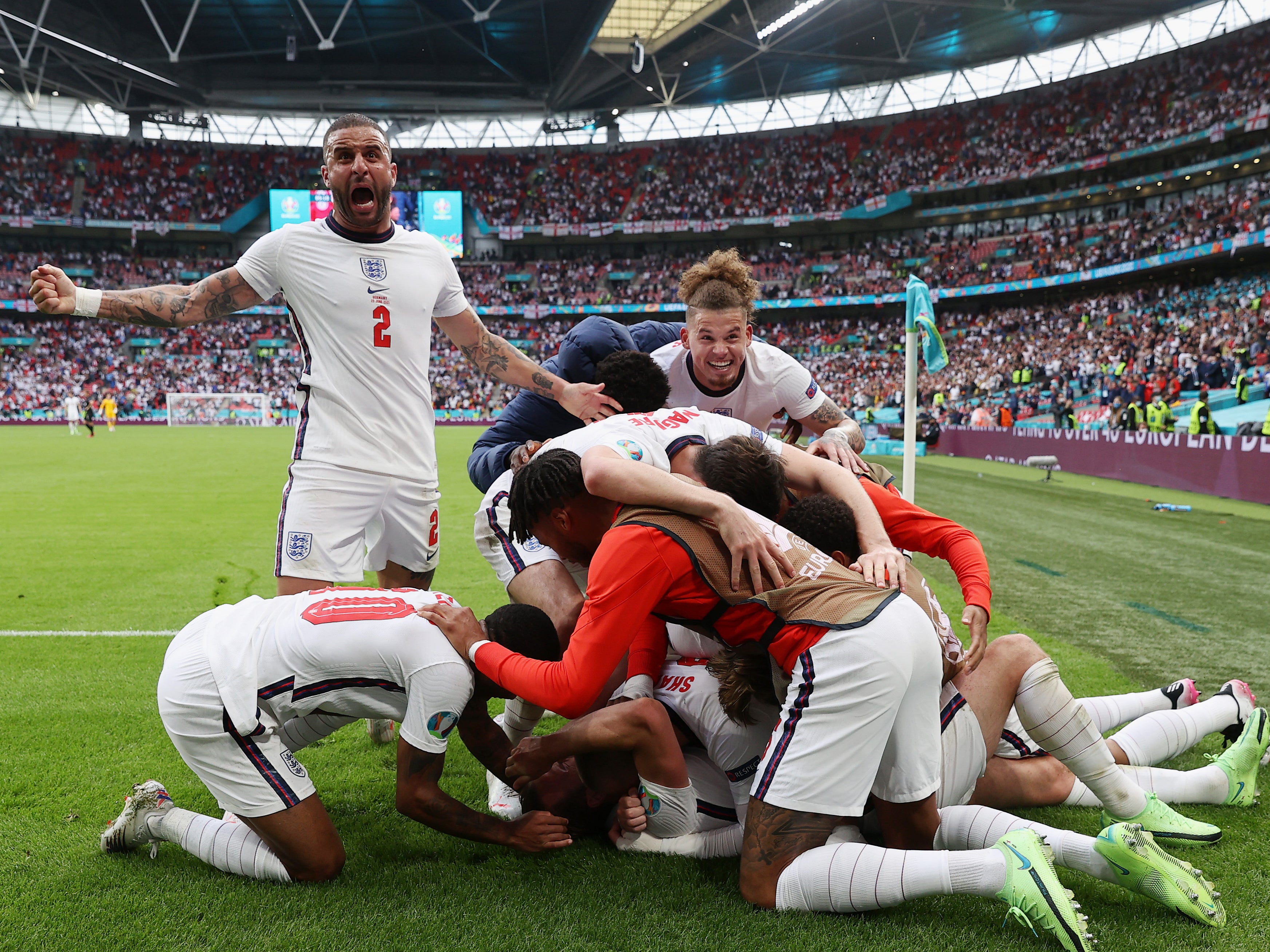 <p>Harry Kane celebrates with England teammates at Wembley</p>