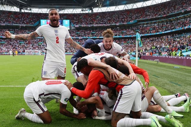 <p>Harry Kane celebrates with England teammates at Wembley</p>