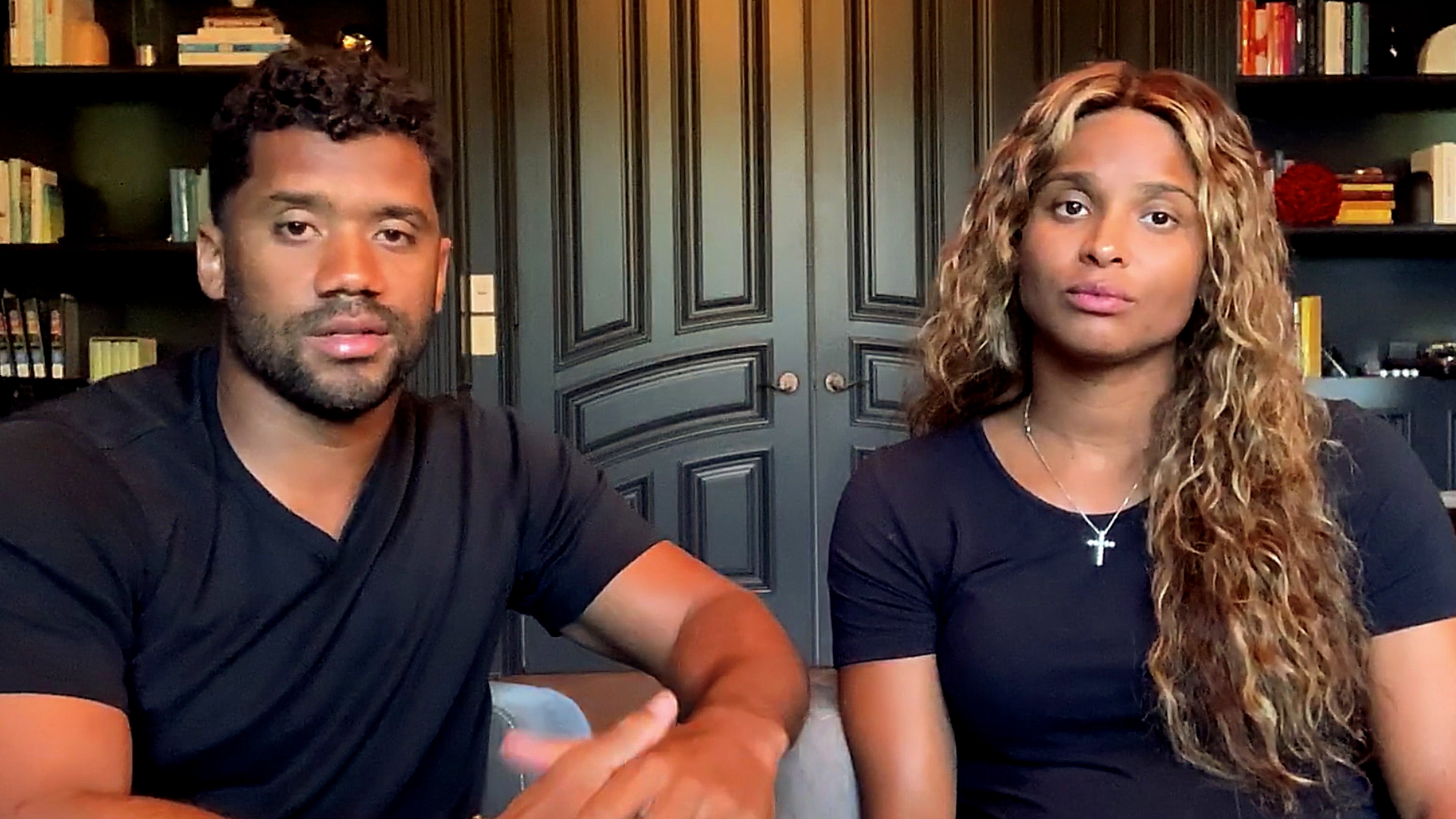 Russell Wilson and Ciara pictured at home in June 2020.