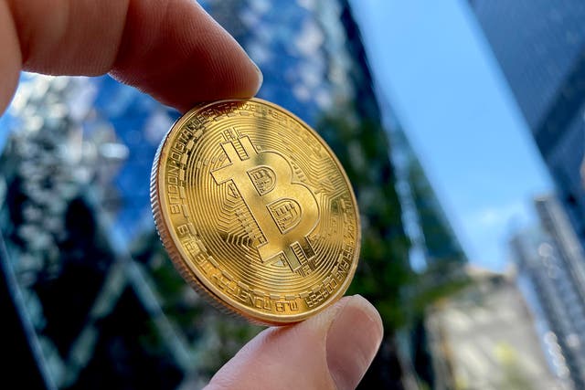<p>A visual representation of Bitcoin cryptocurrency is pictured on May 30, 2021 in London, England</p>