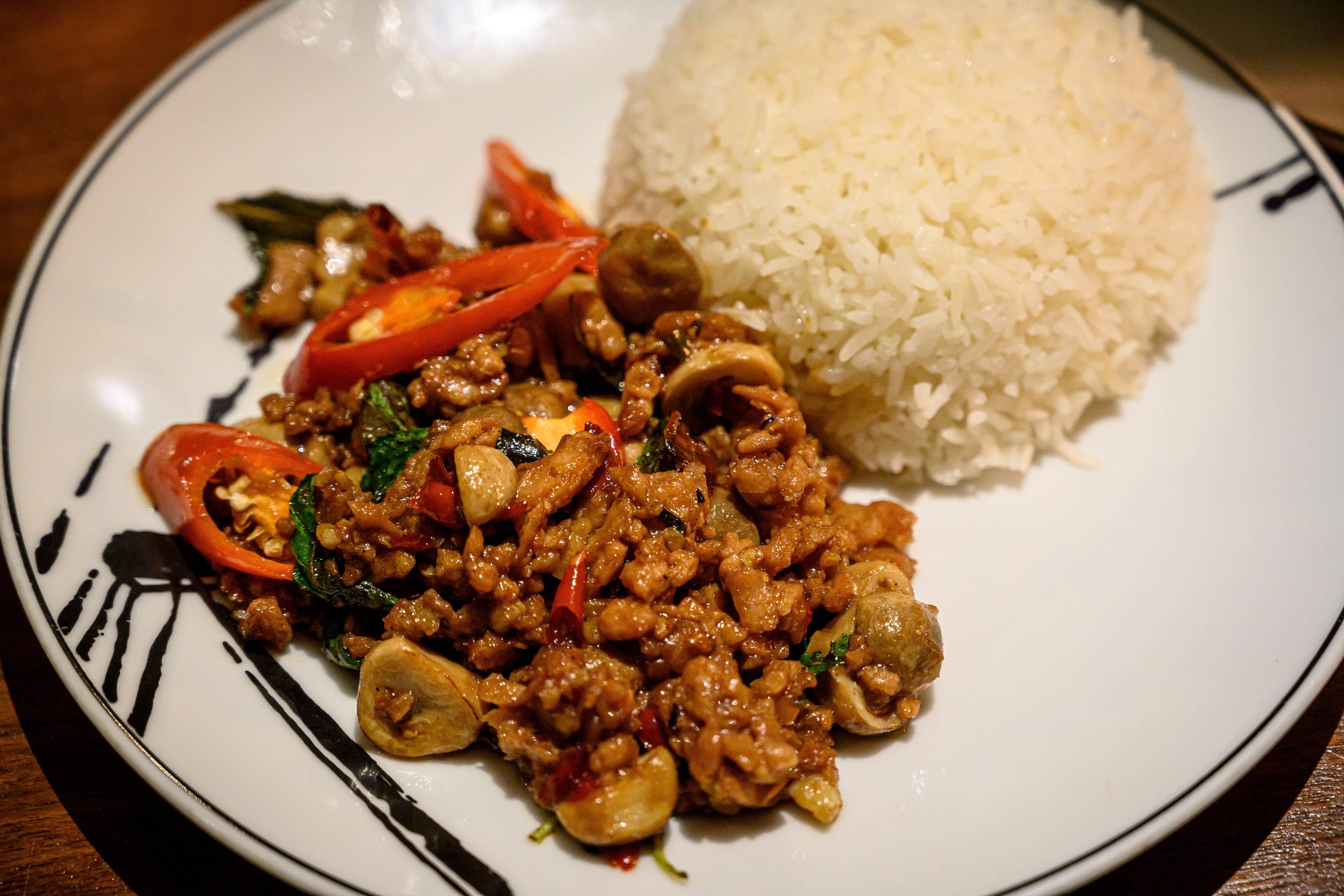 A vegetarian version of pad kra phao, using a meat substitute and stir-fried with basil and chili, served at a restaurant in Bangkok