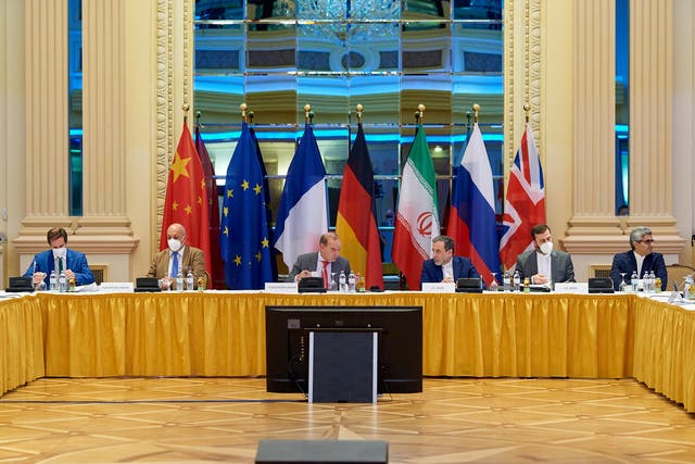 <p>Deputy Secretary General Enrique Mora and Iranian Deputy at Ministry of Foreign Affairs Abbas Araghchi wait for the start of talks on reviving the 2015 Iran nuclear deal in Vienna in June</p>