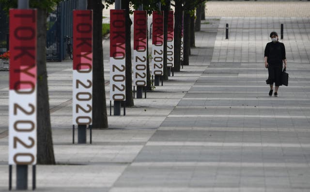 <p>The logos of Tokyo 2020 are displayed at a street near Odaiba Seaside Park in the Japanese capital</p>