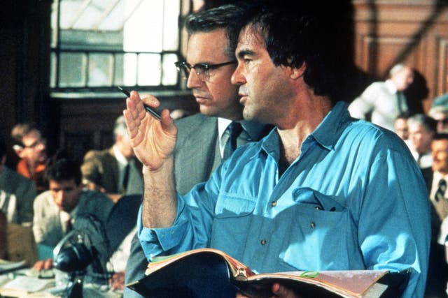 <p>Kevin Costner on the set of ‘JFK’ with Oliver Stone, who was both praised and ridiculed when the film came out</p>