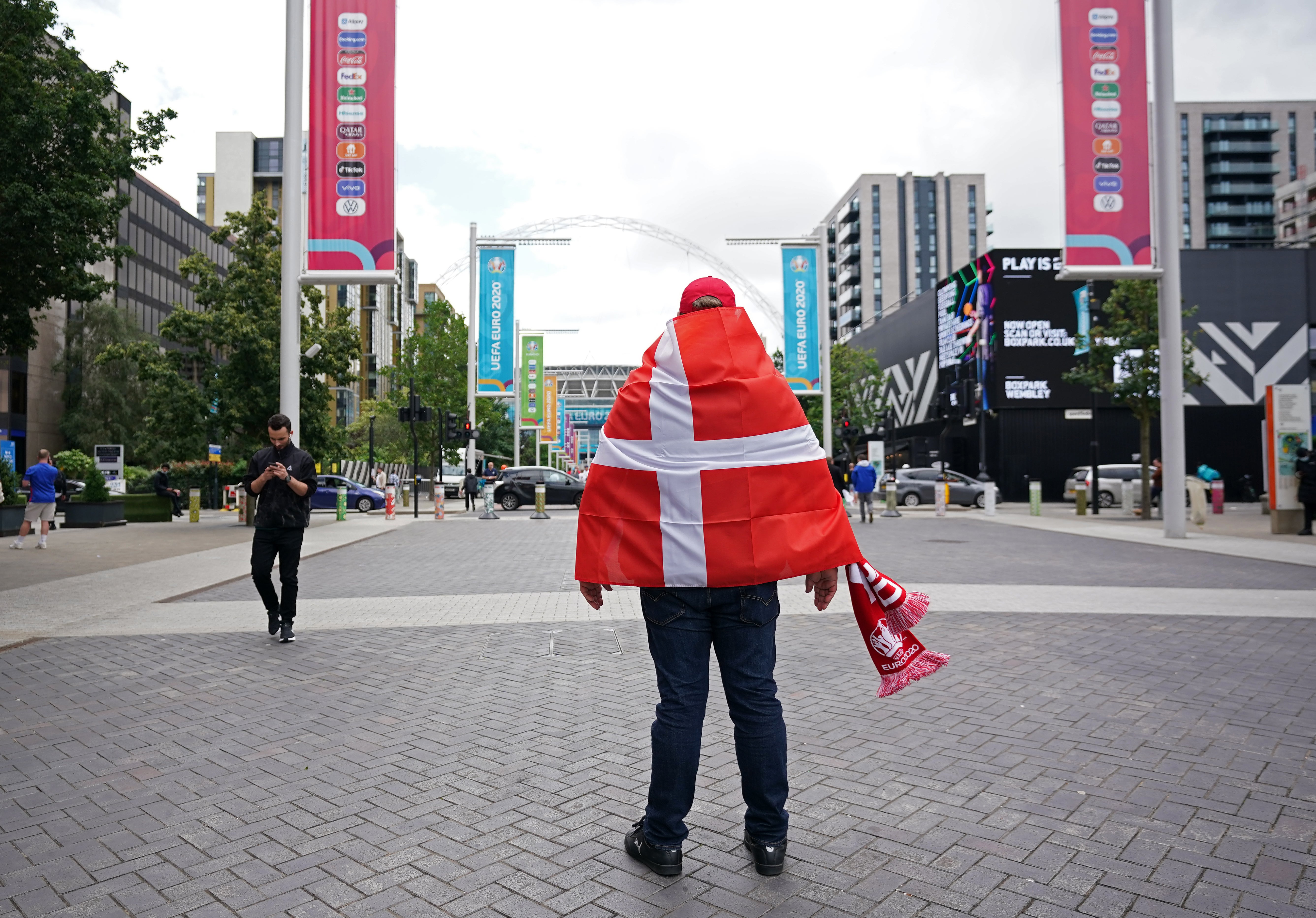 A Denmark fan surveys the scene before the semi-final match started at Wembley