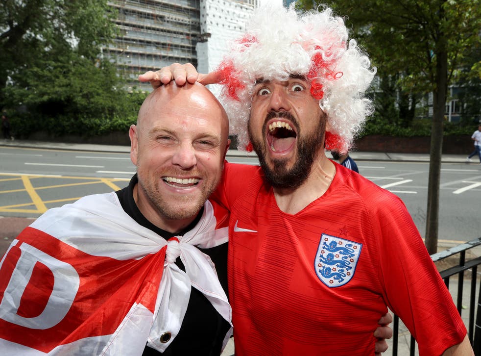 England fans pose ahead of Wednesday's game against Denmark (Nick Potts/PA)
