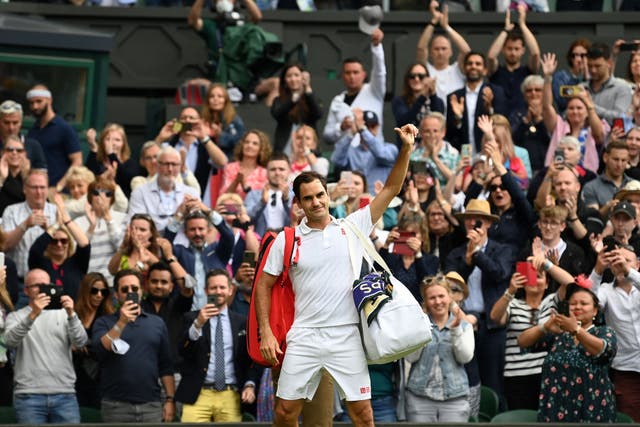<p>Roger Federer salutes an adoring Centre Court crowd</p>
