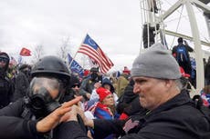 Man charged in attack on AP photographer, police at Capitol