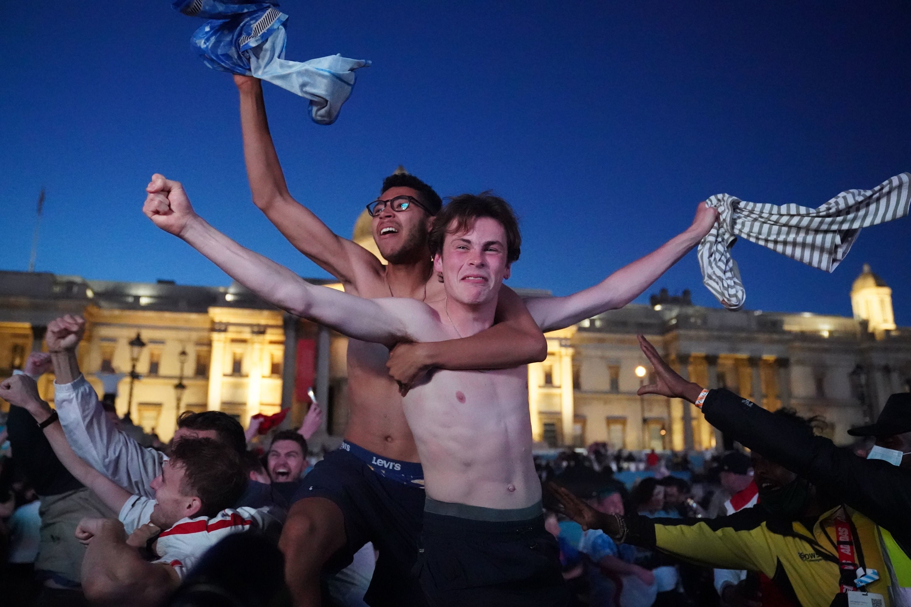 Fans in Trafalgar Square celebrate Harry Kane’s goal against Denmark