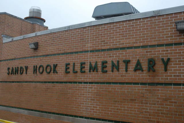 <p>A handout crime scene evidence photo provided by the Connecticut State Police shows the exterior of the Sandy Hook Elementary School after the 2012 shooting</p>