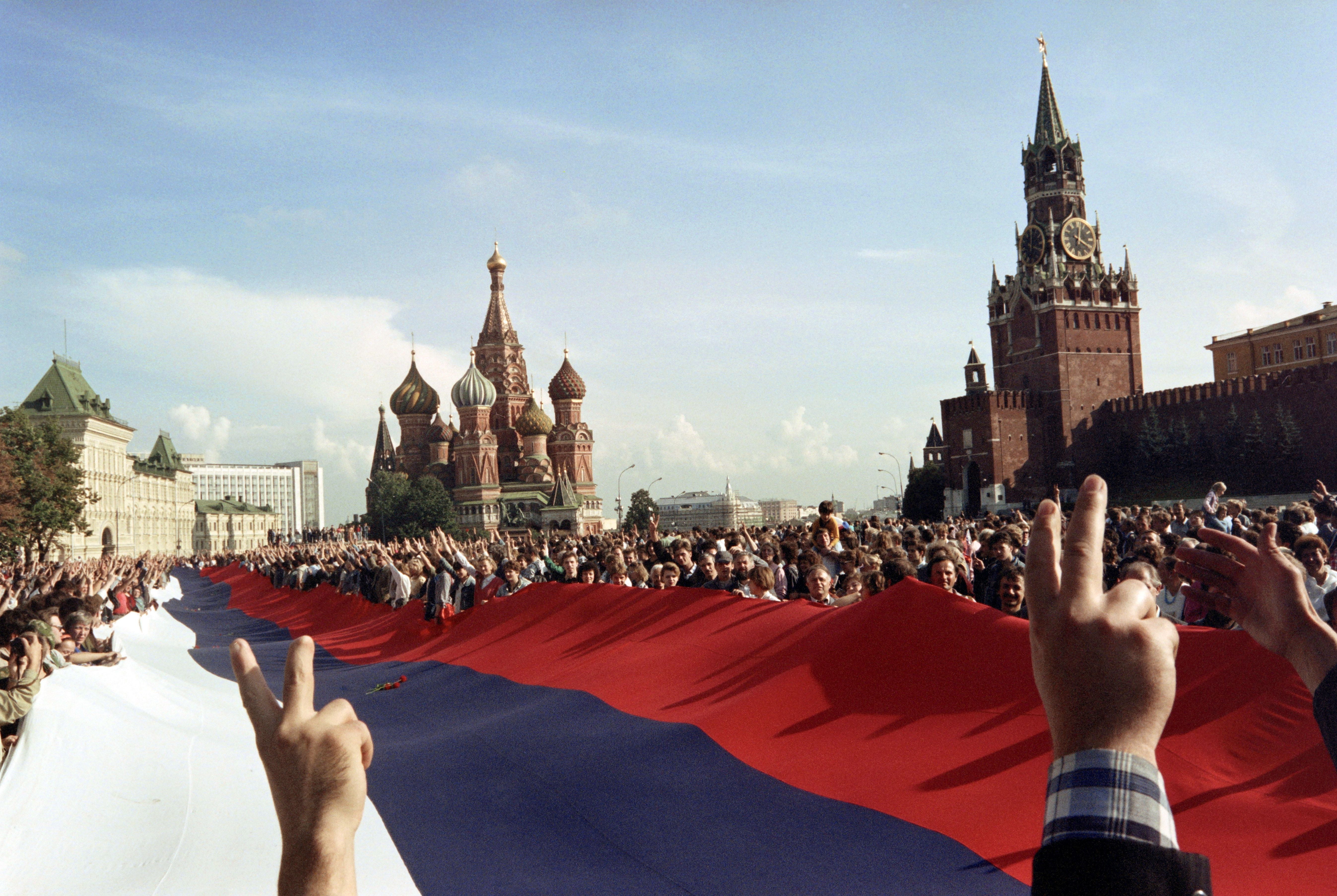 1991: Russians in Red Square celebrate the failure of a hardline communist-led coup which nearly toppled Soviet president Mikhail Gorbachev