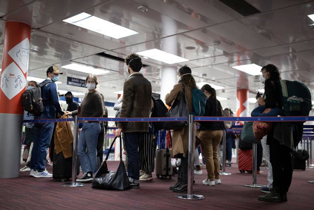 <p>File: Passengers queue up at Roissy Charles de Gaulle airport, near Paris, on 25 April, 2021</p>