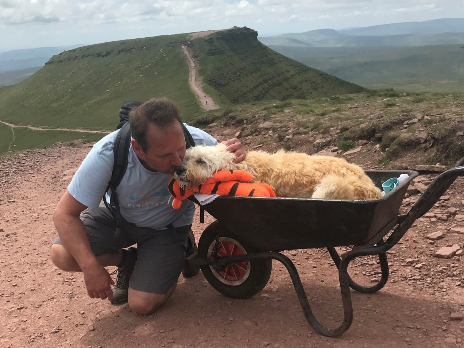 Carlos and Monty at the top of Pen-y-Fan in Wales