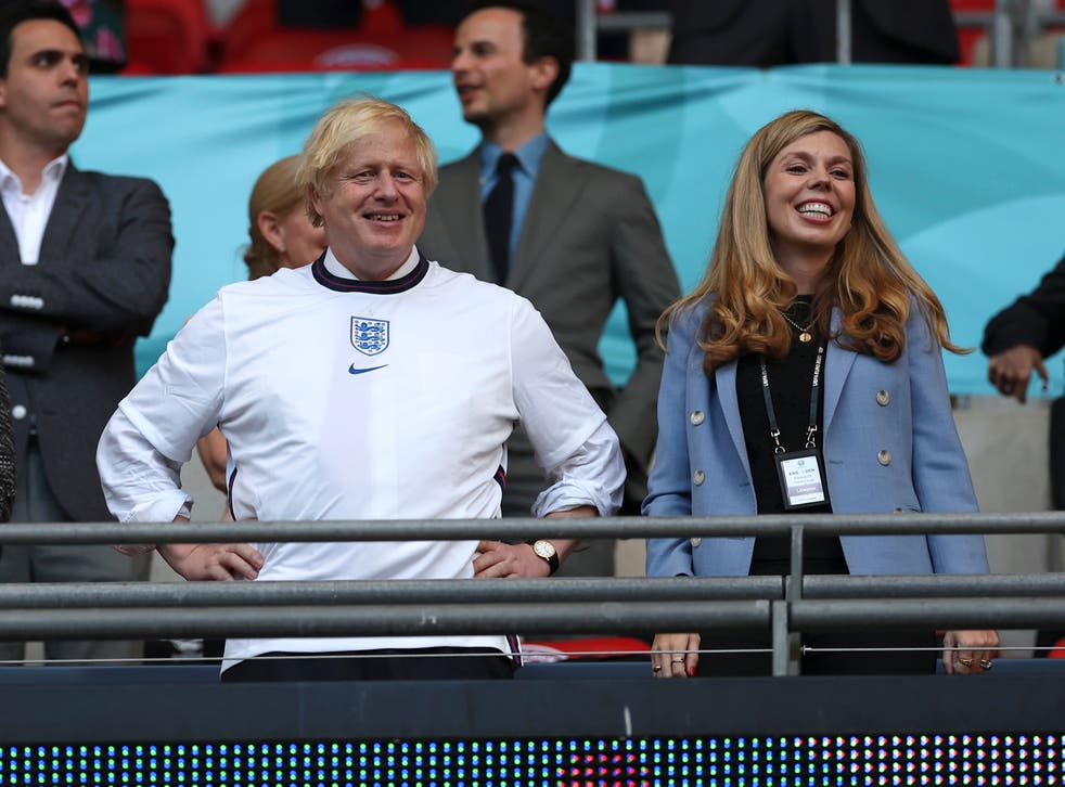 <p>Boris Johnson with his wife Carrie at Wembley on Wednesday evening</p>
