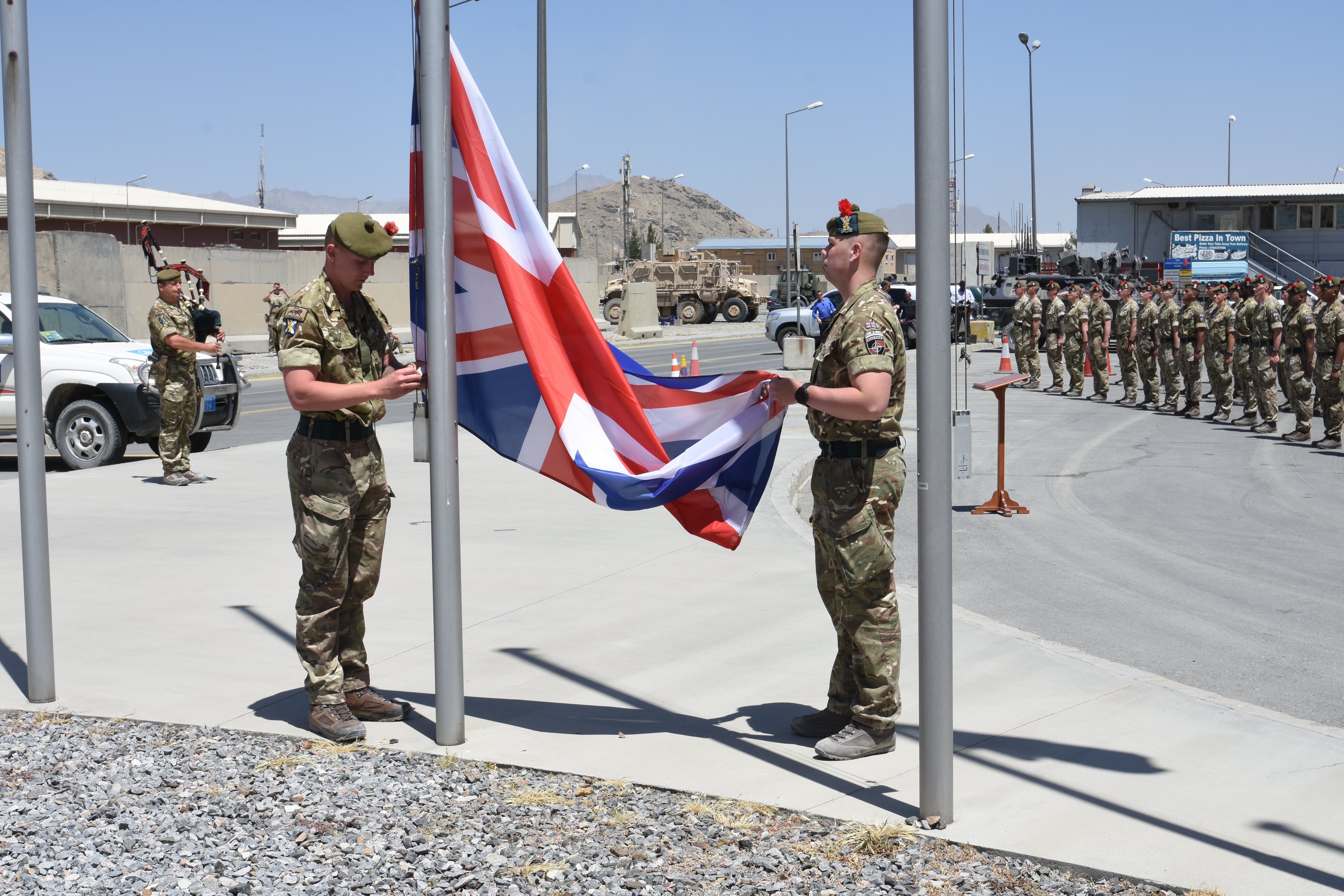 Brigadier Oliver Brown, General Miller and the UK Ambassador attended a flag lowering ceremony in Afghanistan