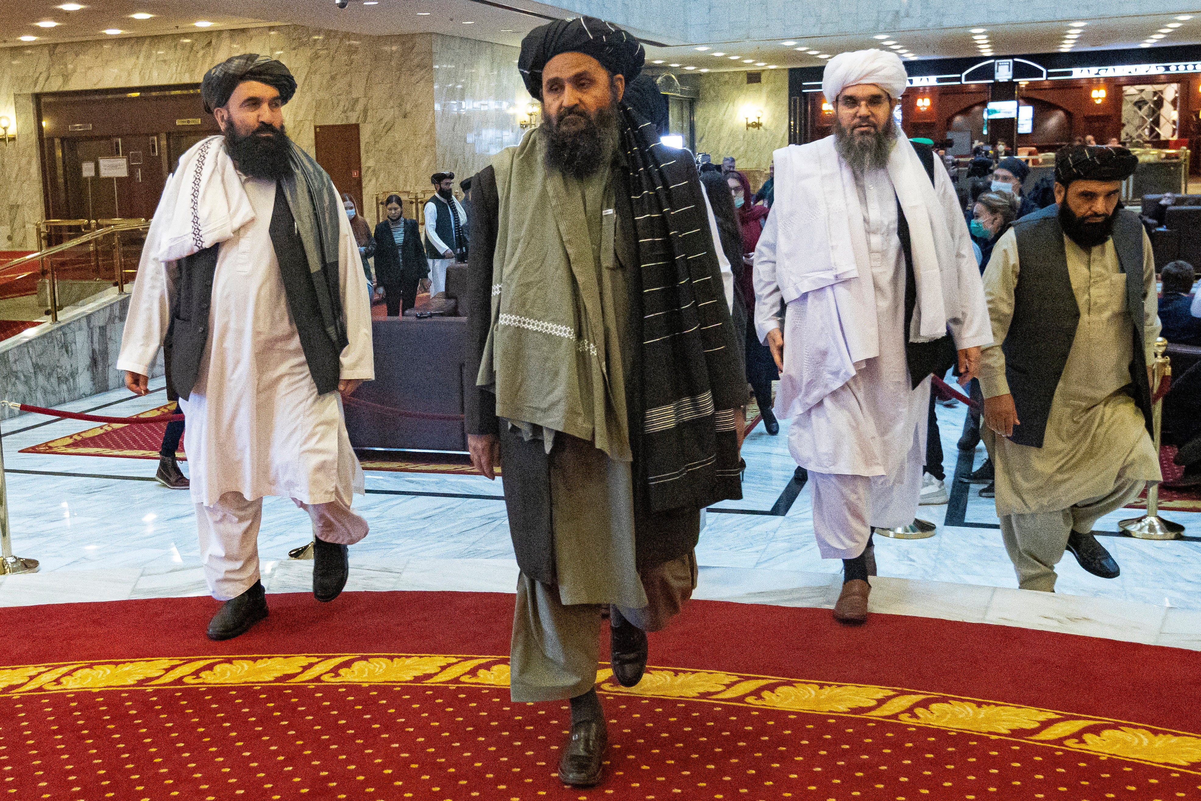 Taliban co-founder Mullah Abdul Ghani Baradar, center, at an international peace conference in Russia in March