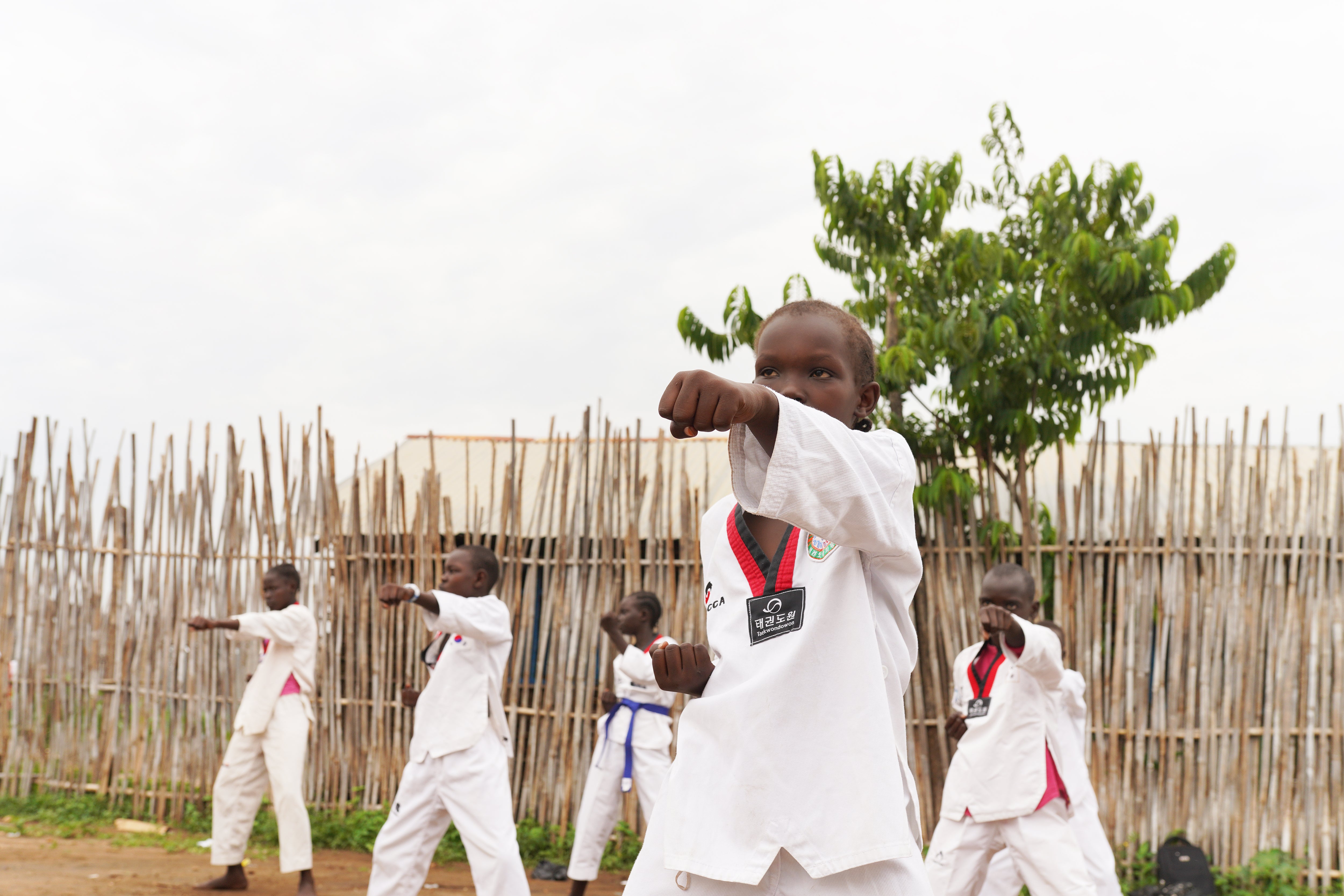 A 10 year-old Taekwando player from the Mercy School Taekwando Club is training on July 8, 2021 in Juba. Some suggest the younger generation could provide solutions