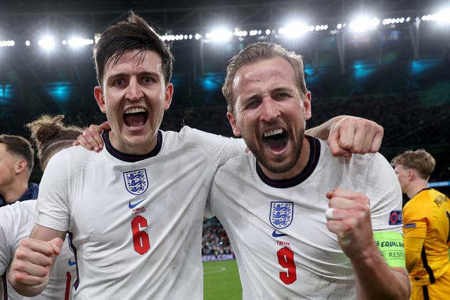 <p>Harry Maguire and Harry Kane celebrate England’s win over Denmark</p>