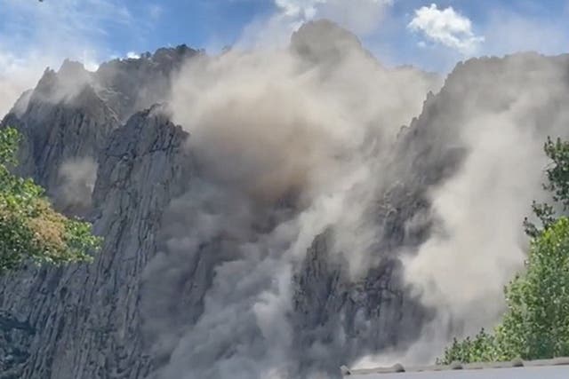 <p>Dust rising from side of cliff after an earthquake in Coleville, California, U.S. July 8, 2021 in this still image from a social media video. </p>