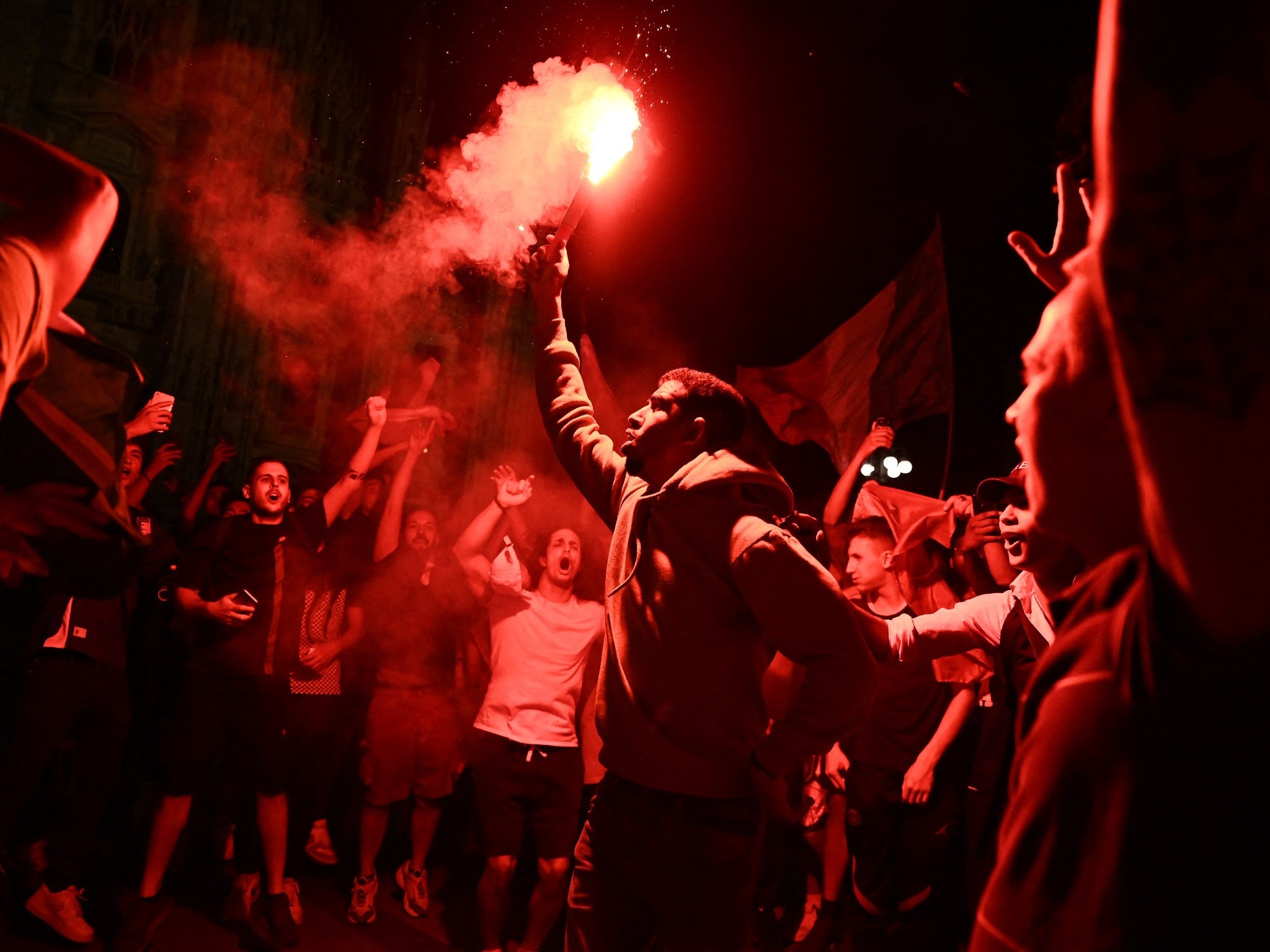 <p>Italy fans celebrate in Milan after the team’s win in the semi-finals of Euro 2020</p>