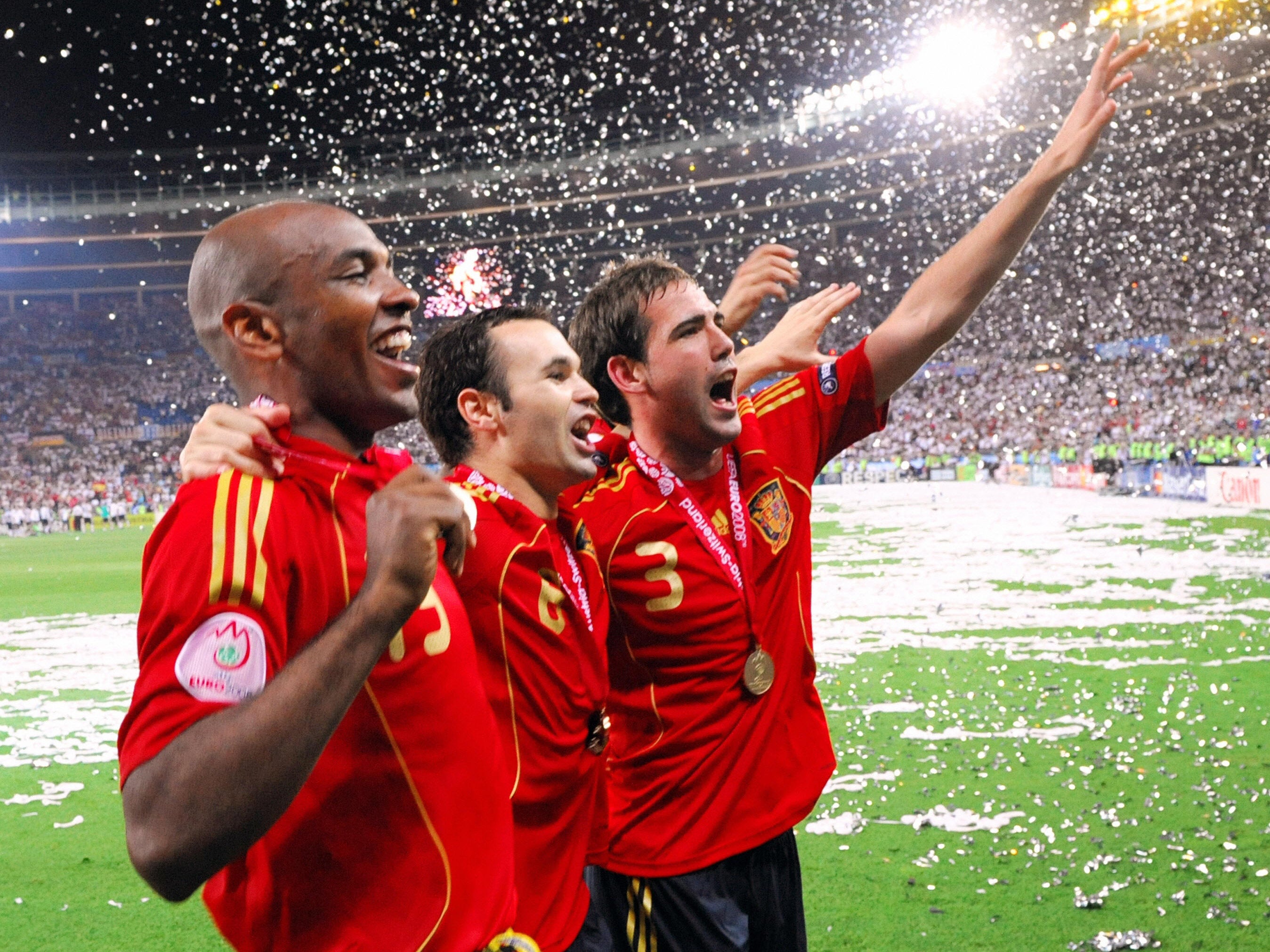 Andrés Iniesta (centre) celebrates winning the European Championship in 2008