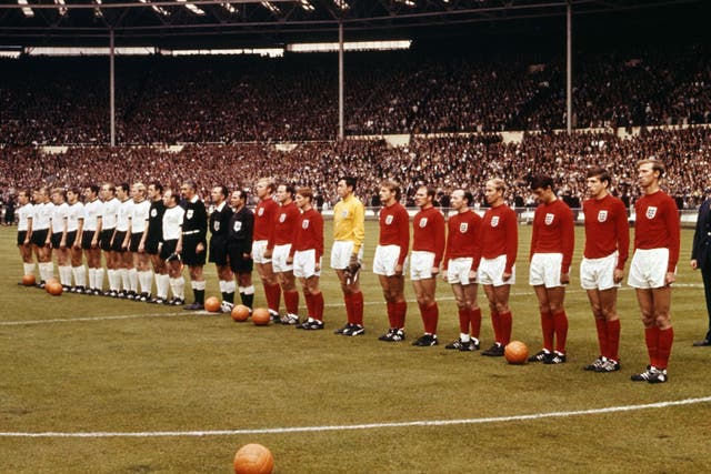 <p>The teams for West Germany and England line up before kick off at Wembley in 1966</p>