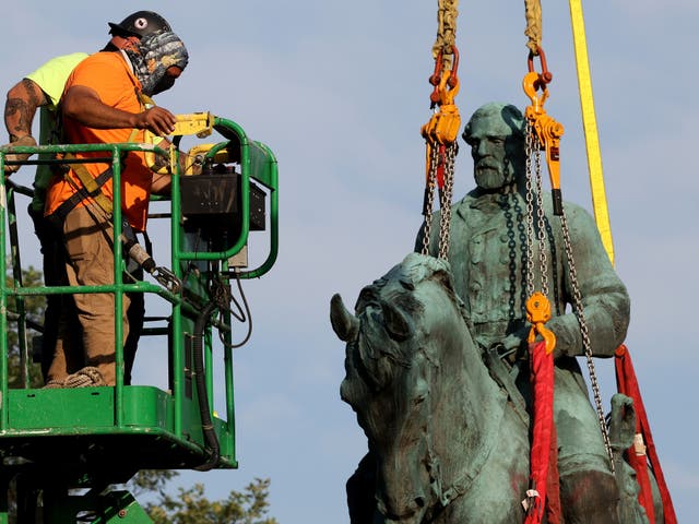 <p>Statue of Confederate General Robert E Lee being torn down in 2021 </p>