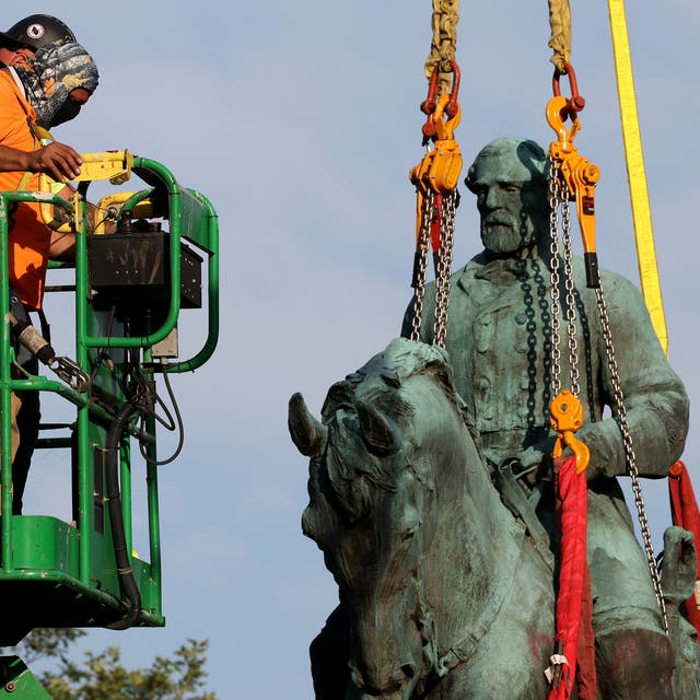 <p>Statue of Confederate General Robert E Lee being torn down in 2021 </p>