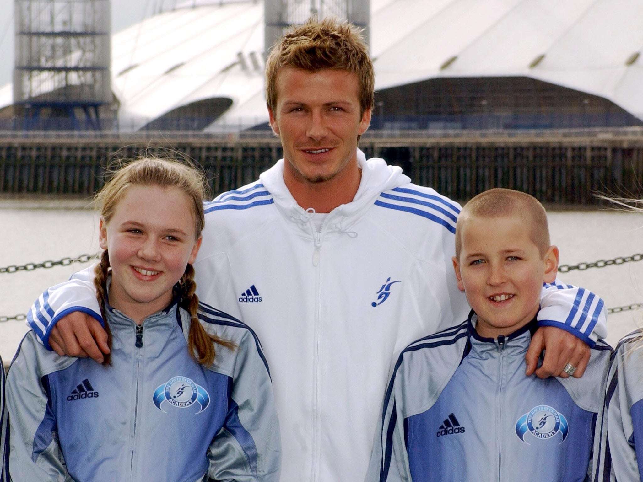 An 11-year-old Harry Kane with his future wife, Katie, and David Beckham