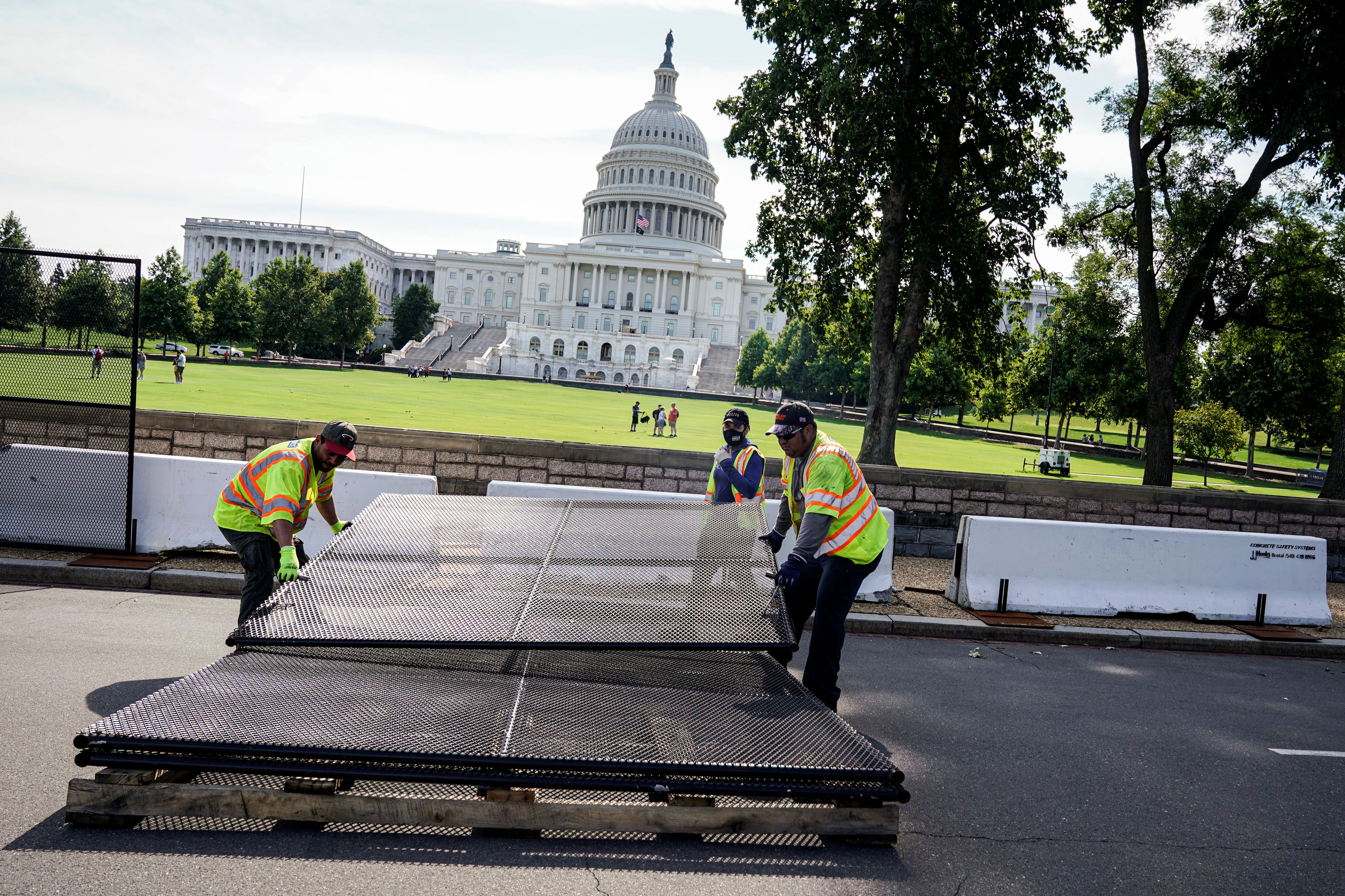 Crowds return to the US Capitol grounds in Washington DC on 10 July after crews removed the final barricades installed after the riot on 6 January.