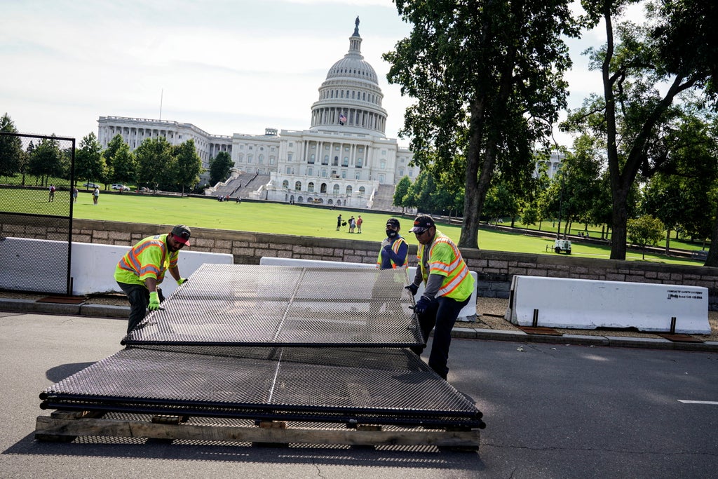 Fencing removed and crowds enter US Capitol ground for first time since 6 January riot